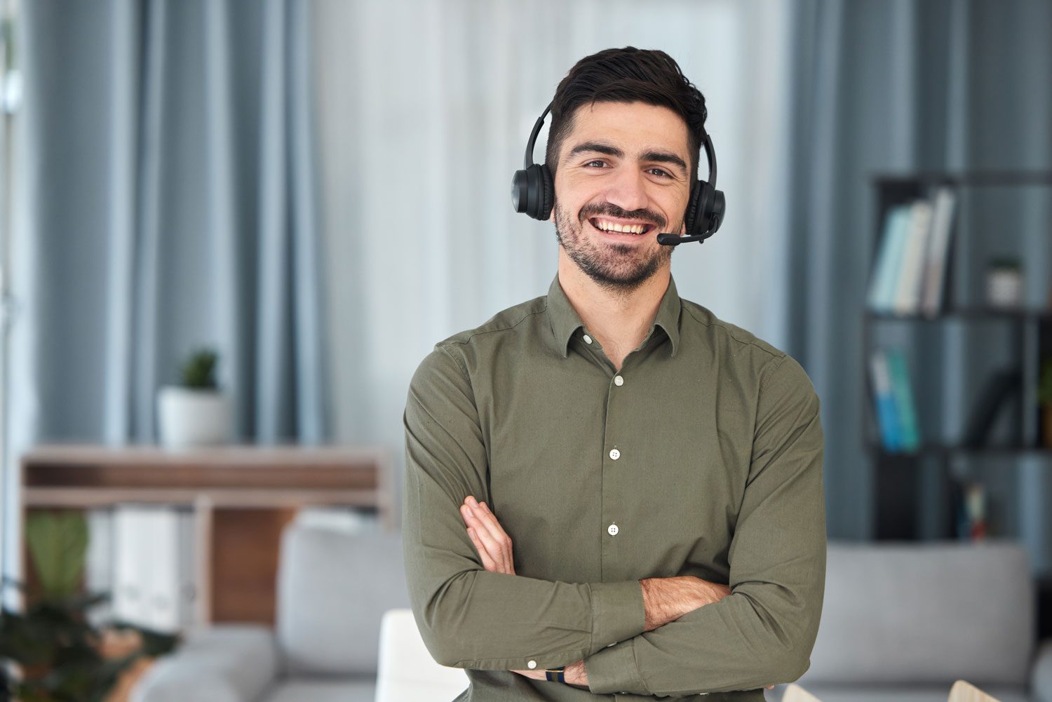 a man wear microphone for working in the home office for virtual assistant voip communication